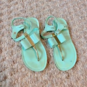 Kate Spade Jelly Sandals with Gold Bow Detail